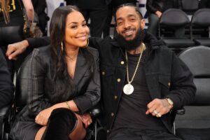 nipsey-hussle-and-lauren-london-attend-a-basketball-game-news-photo-1579809341